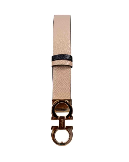 Shop SALVATORE FERRAGAMO  Belt: Salvatore Ferragamo reversible belt made of hammered calfskin.
Gancini buckle in gold finish.
Adjustable in length.
Height 2.5 cm.
Composition: 100% calf.
Made in Italy.. 23A565 674559-543NERO/BEIGE